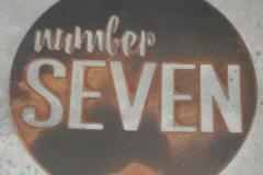 number seven house sign